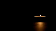 lit-tin-candle-dark-conveying-memorial-death-hope-darkness.jpg